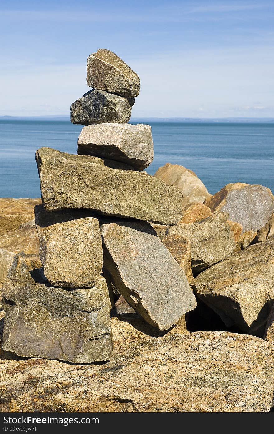 A rock statue built near the ocean