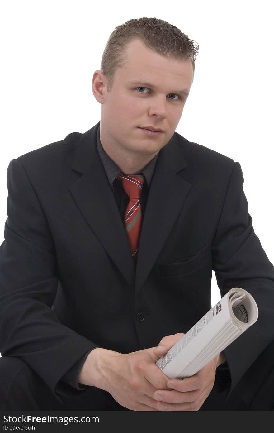 Man with newspaper against a white background