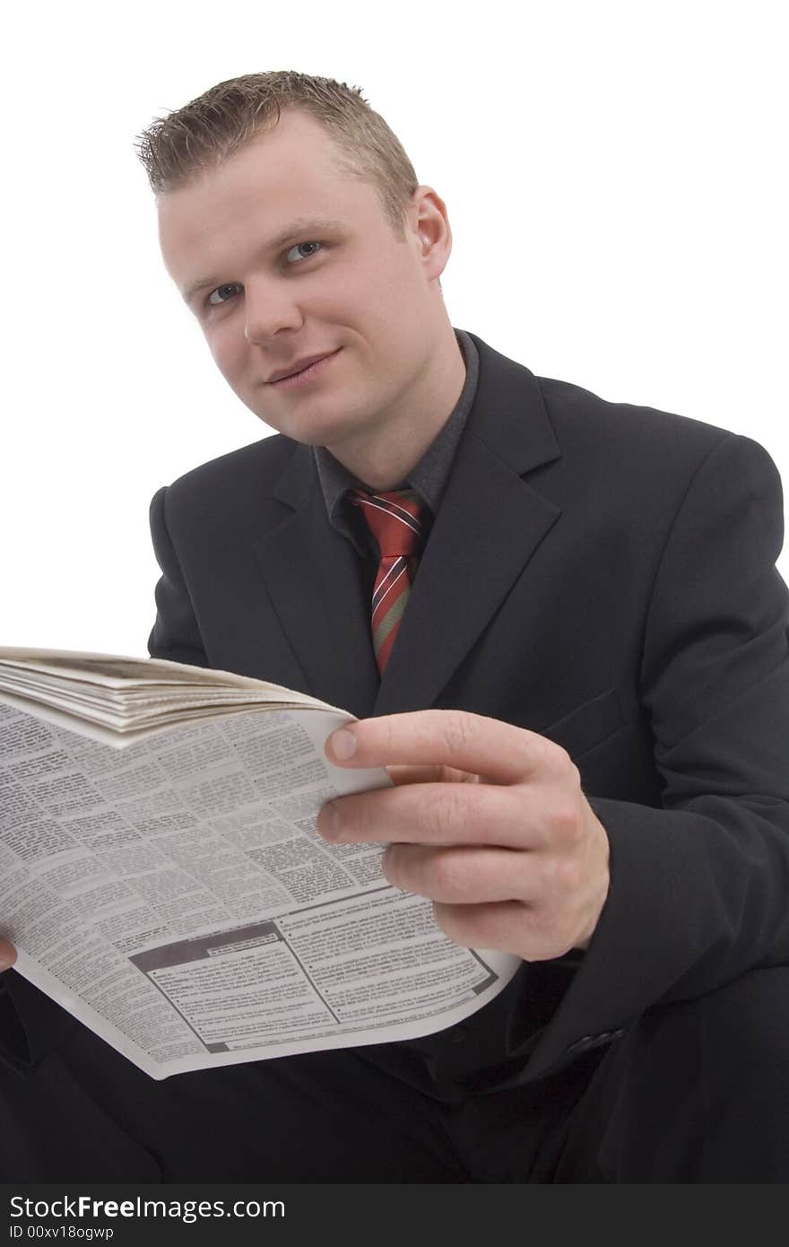 Man with newspaper against a white background