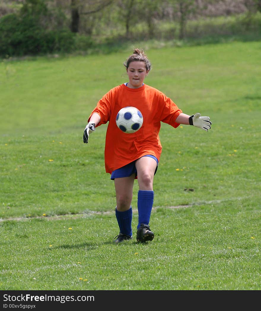 Teen Youth Teen Soccer Goalie ready to kick ball. Teen Youth Teen Soccer Goalie ready to kick ball