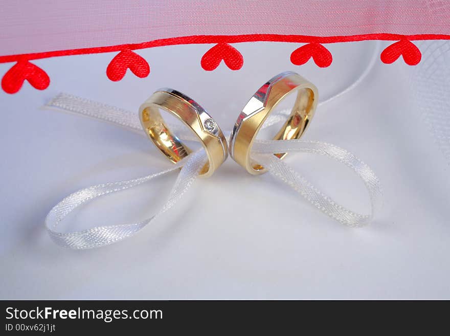 Wedding rings on a white background