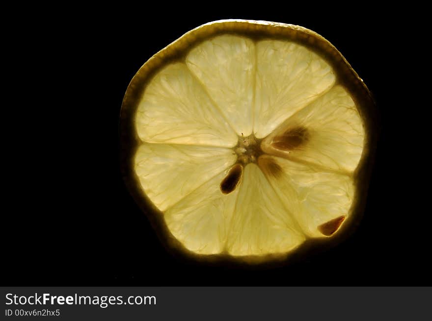 Backlit lemon on isolated background