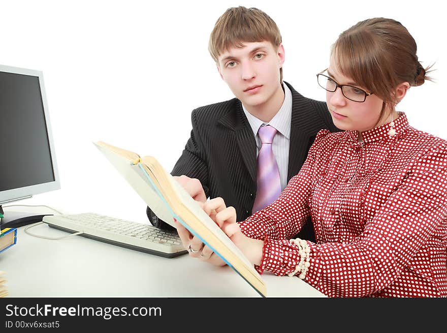 Group of business people working together. Shot in studio. Group of business people working together. Shot in studio.