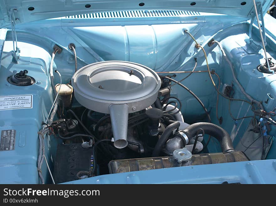 The view of a perfectly kept old vehicles engine bay. The view of a perfectly kept old vehicles engine bay