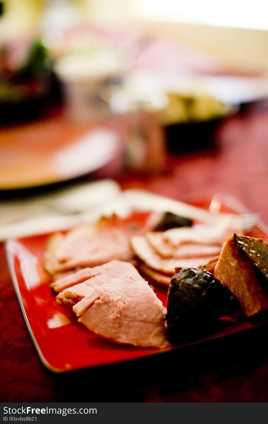 Close up of plate of sliced delicious ham. Close up of plate of sliced delicious ham