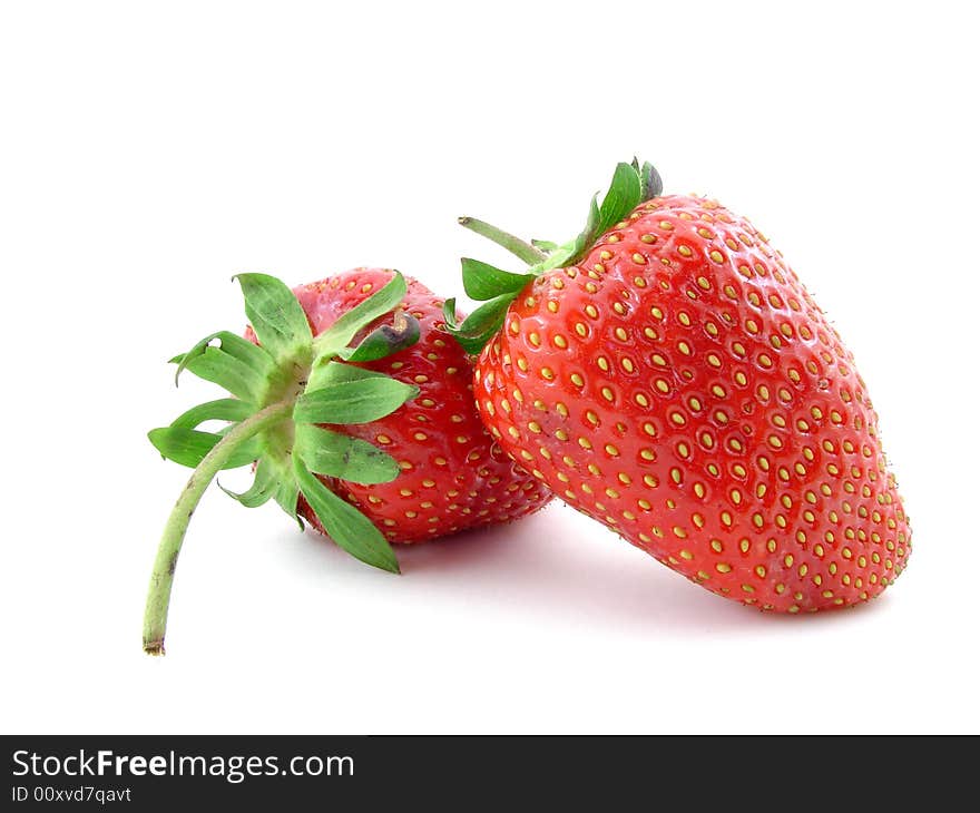 Juicy strawberries isolated over white background, concept of healthy organic, homegrown food and diet.