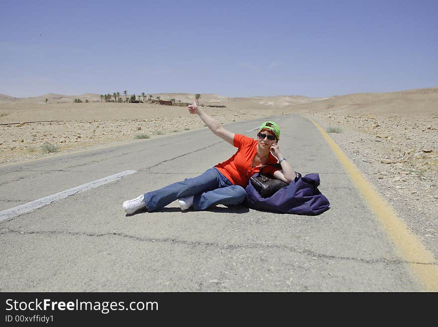 Hitchhiking woman