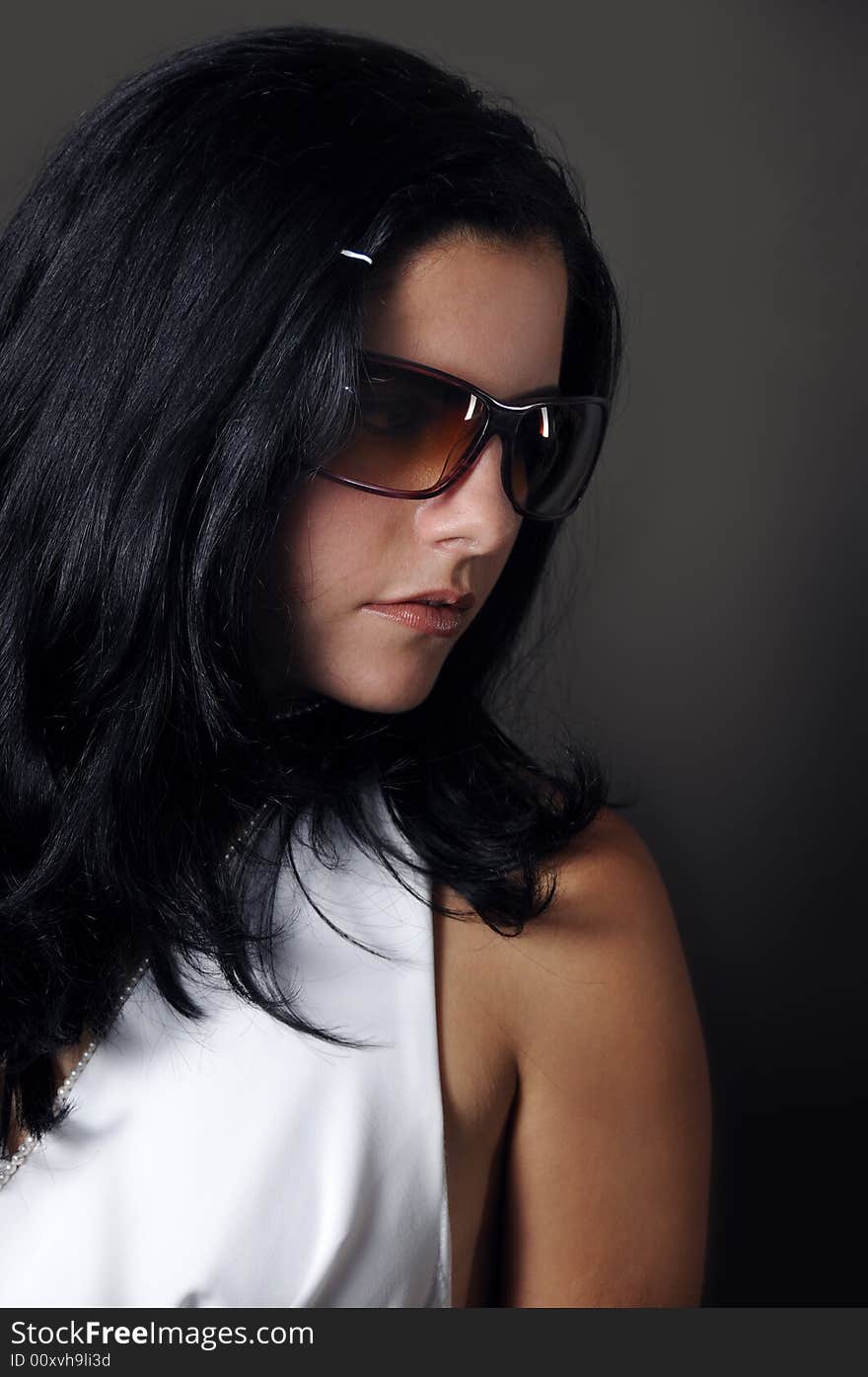 Portrait of hispanic fashion model wearing sunglasses