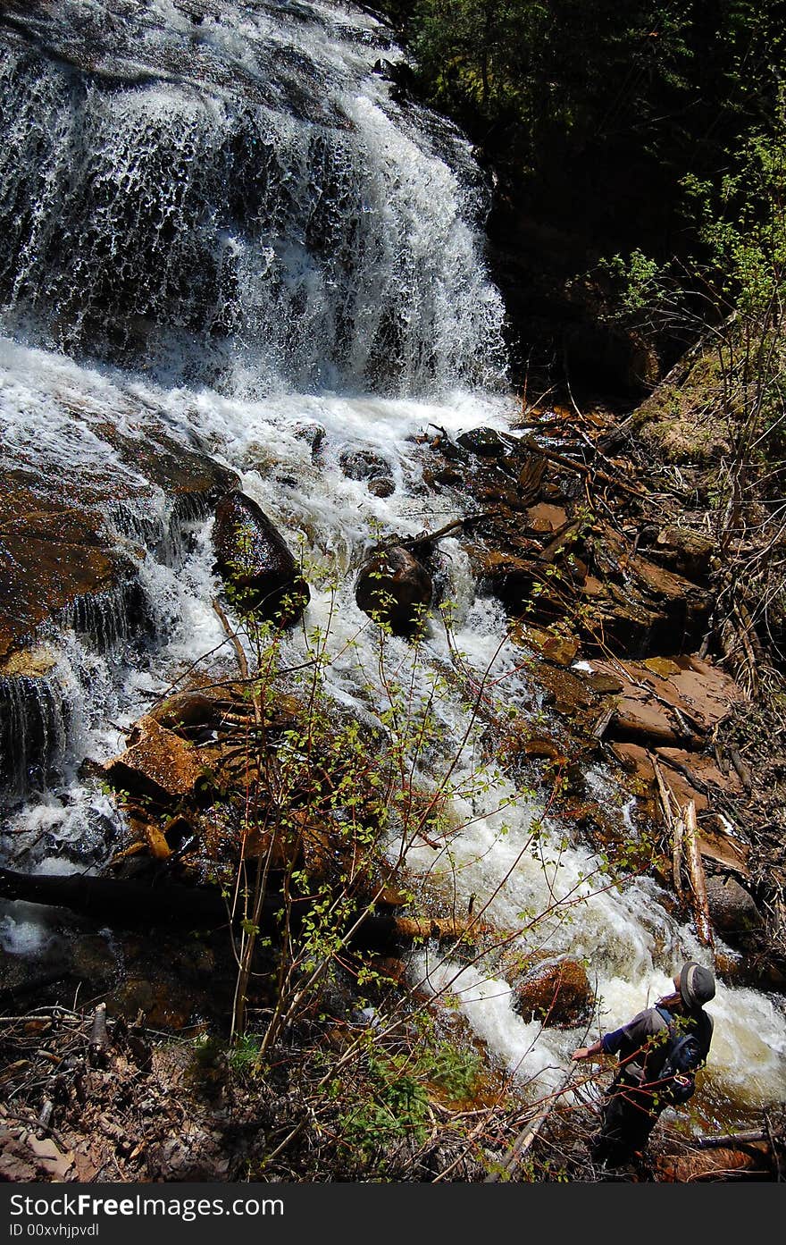 Man Viewing Waterfall