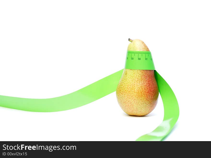 Red pear wrapped in a measuring tape