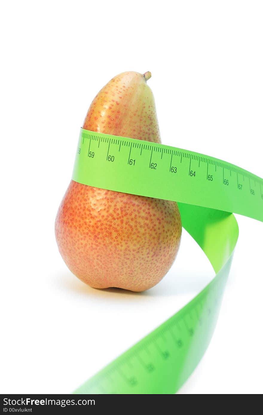 Red pear wrapped in a measuring tape