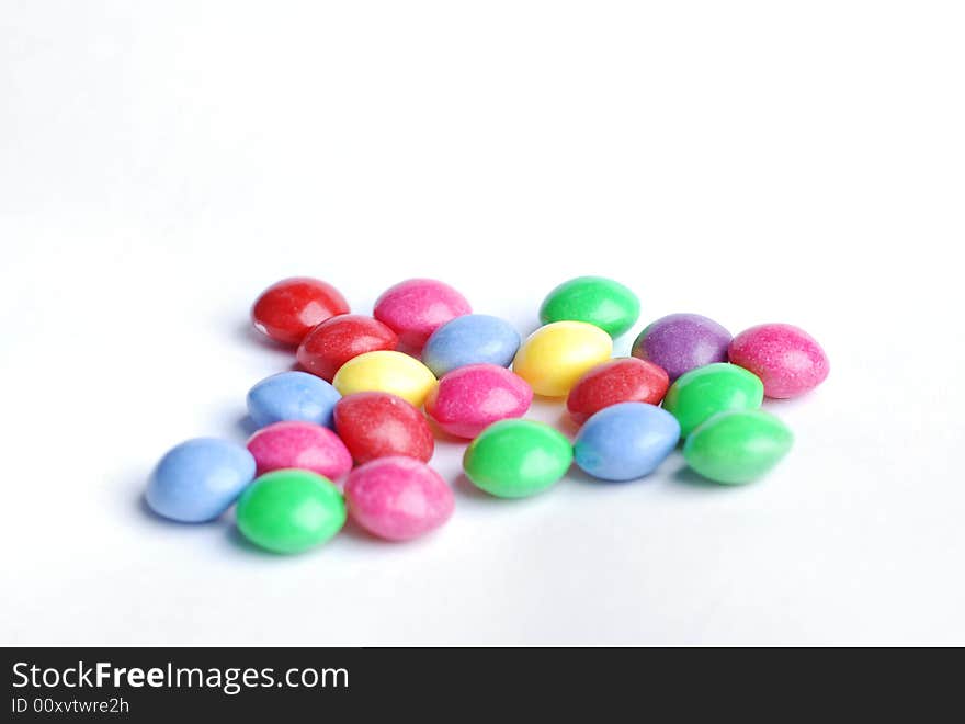 Sweet candy with different colours at white background. Sweet candy with different colours at white background