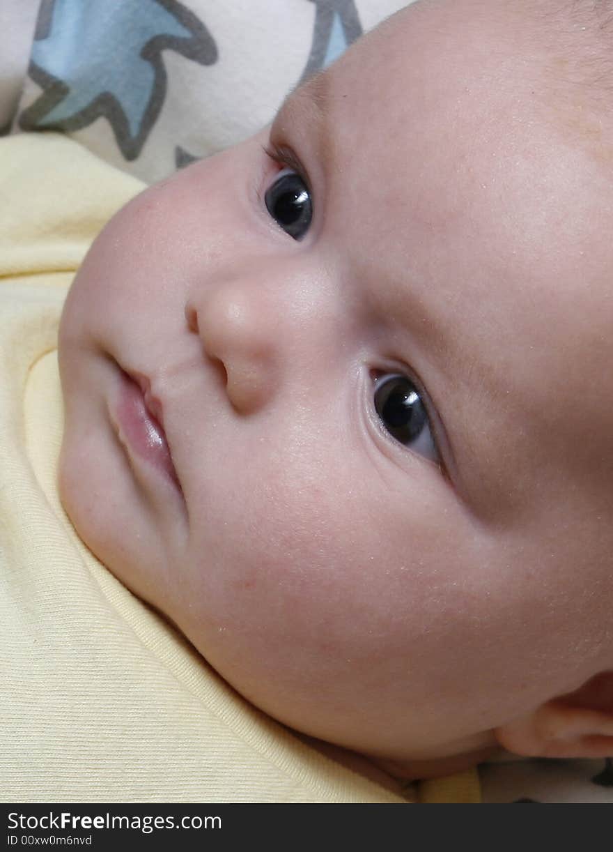 Close-up shot of a four month old baby girl's face. Close-up shot of a four month old baby girl's face.