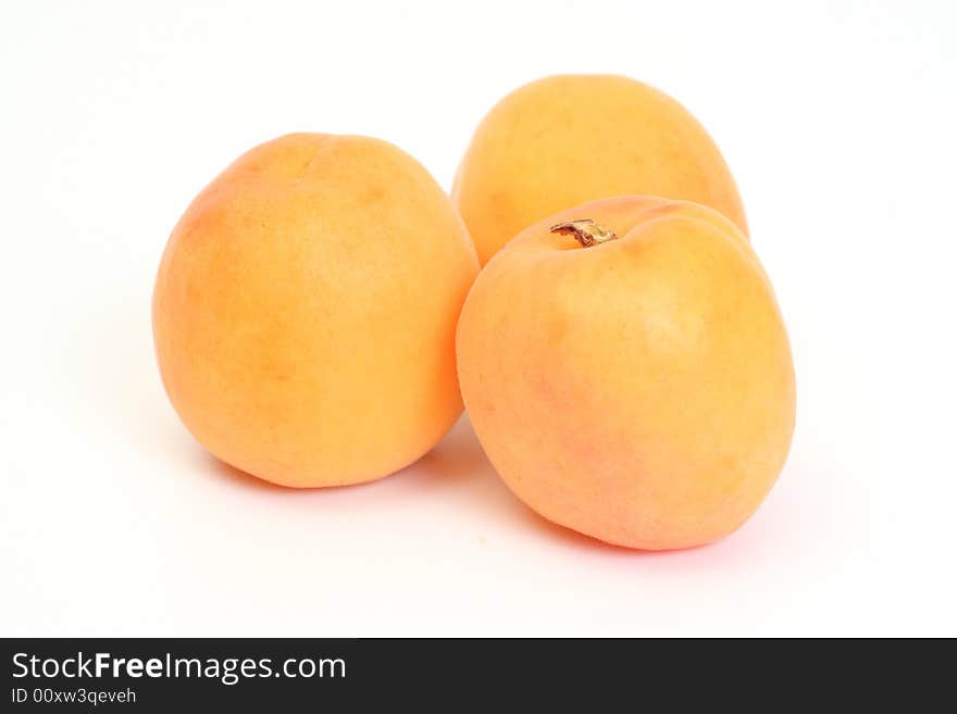 Three sweet apricots