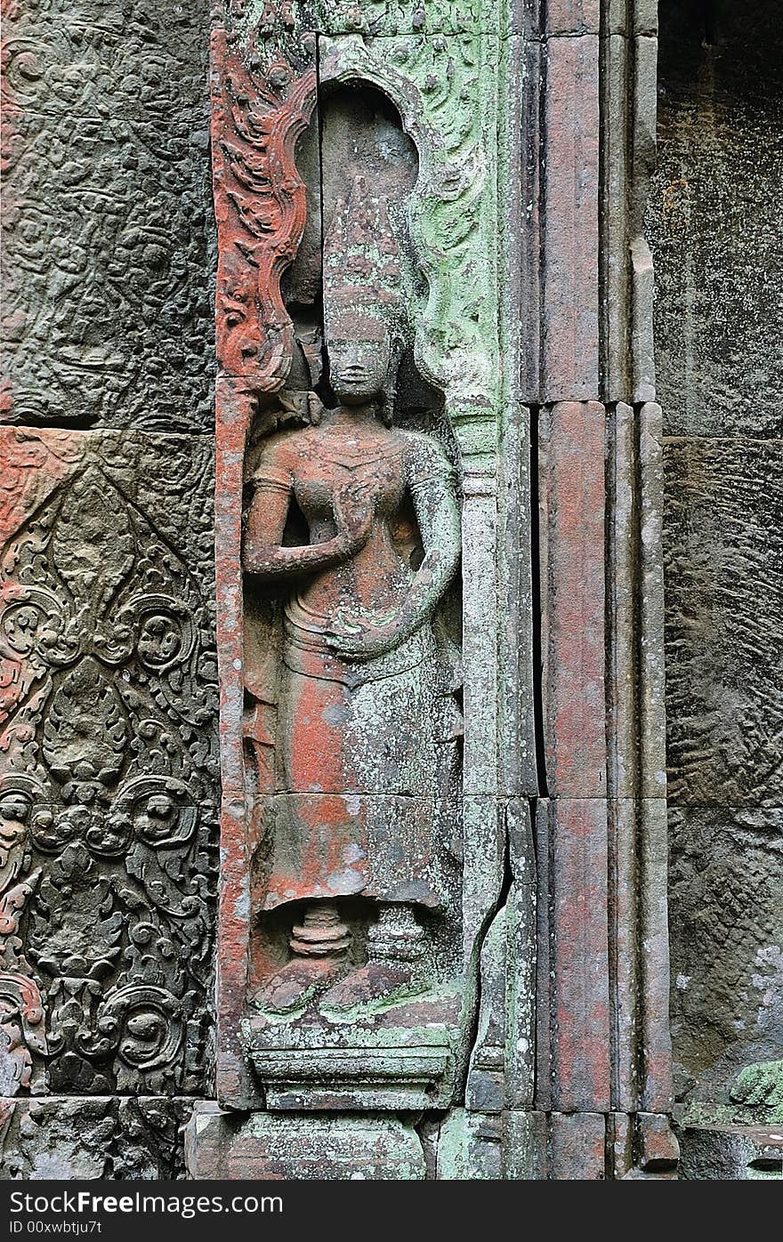 Cambodia; Angkor; Ta Prohm temple: apsara