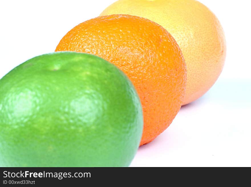 Orange and two grapefruits