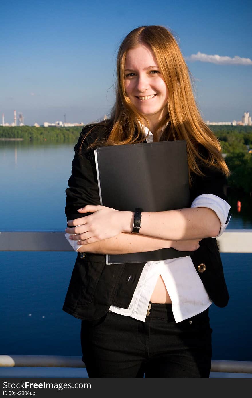 The young businesswoman with a folder