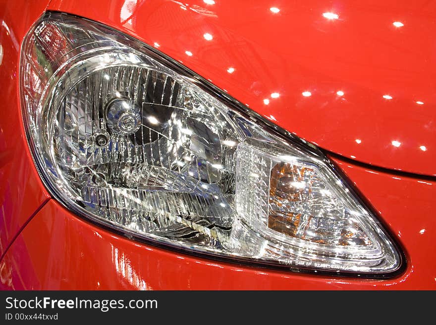 Close-up of a new modern car head lamp. Close-up of a new modern car head lamp