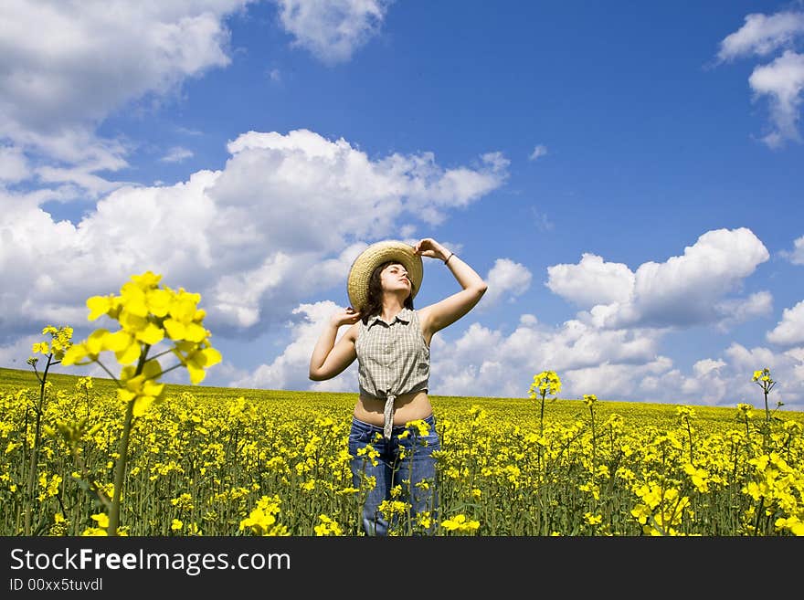 Girl having fun in summer rape field. Girl having fun in summer rape field