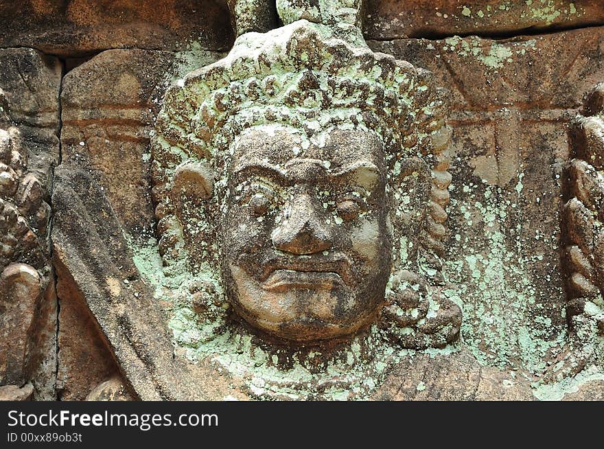 The leper king terrace constructed during the reigns of Jayavarman VII and Jayavarman VIII (12th-13th centuries) overlooking the royal square is supported by 300 meters of walls of foundation. The leper king terrace constructed during the reigns of Jayavarman VII and Jayavarman VIII (12th-13th centuries) overlooking the royal square is supported by 300 meters of walls of foundation