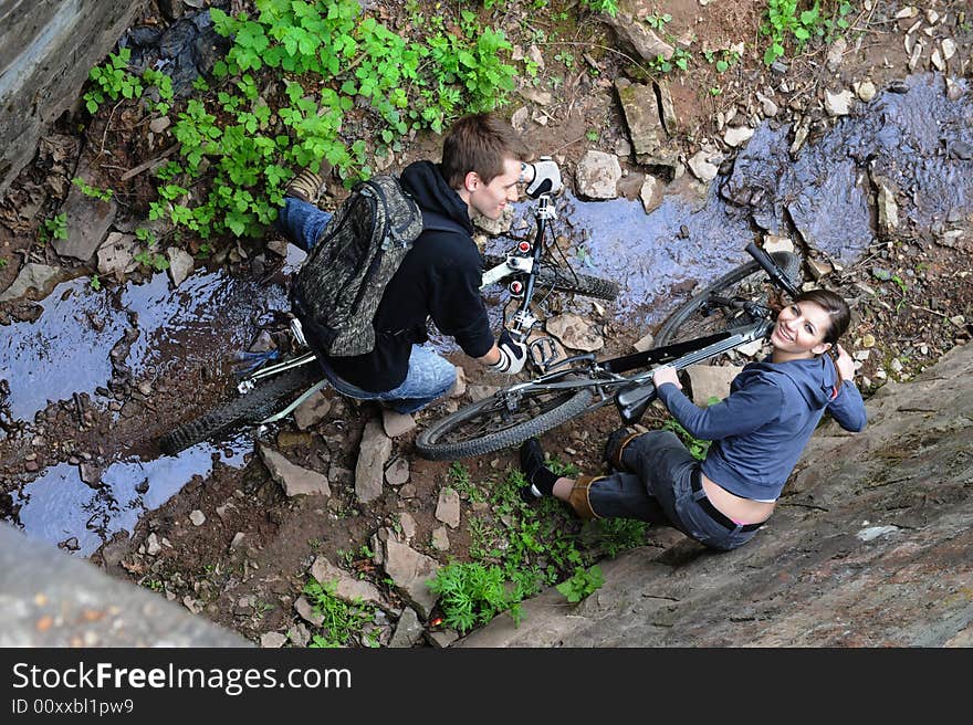 Couple enjoying Walk on bicycles