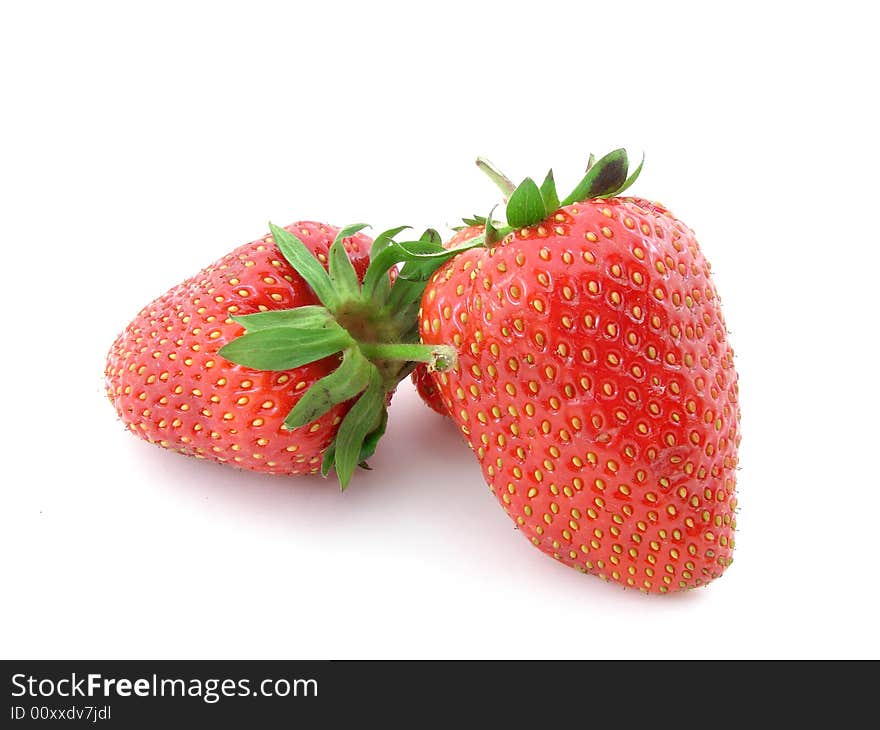 Juicy strawberries isolated over white background, concept of healthy organic, homegrown food and diet.