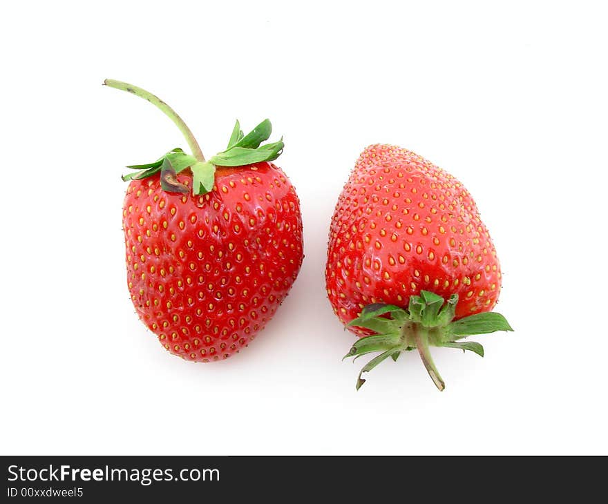 Juicy strawberries isolated over white background, concept of healthy organic, homegrown food and diet.