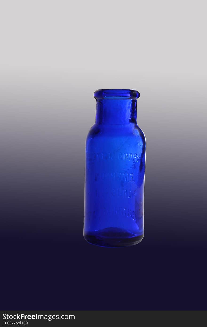 Old blue medicine bottle with clipping path