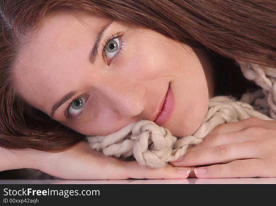 Beautiful young a woman with shawl in closeup