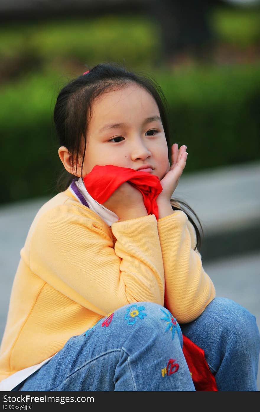 The cute girl in a park . The cute girl in a park .