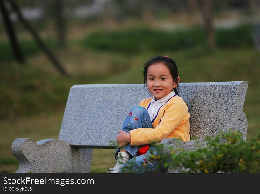 The cute girl in a park. The cute girl in a park.