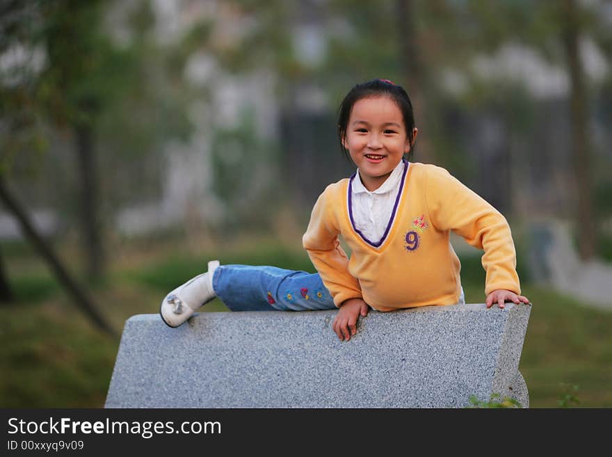 The cute girl in a park. The cute girl in a park.