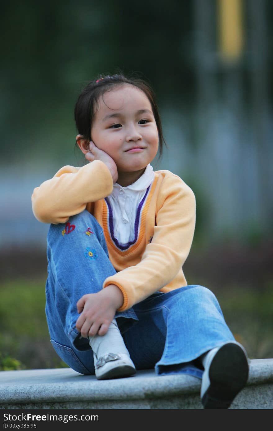 The cute girl in a park. The cute girl in a park.