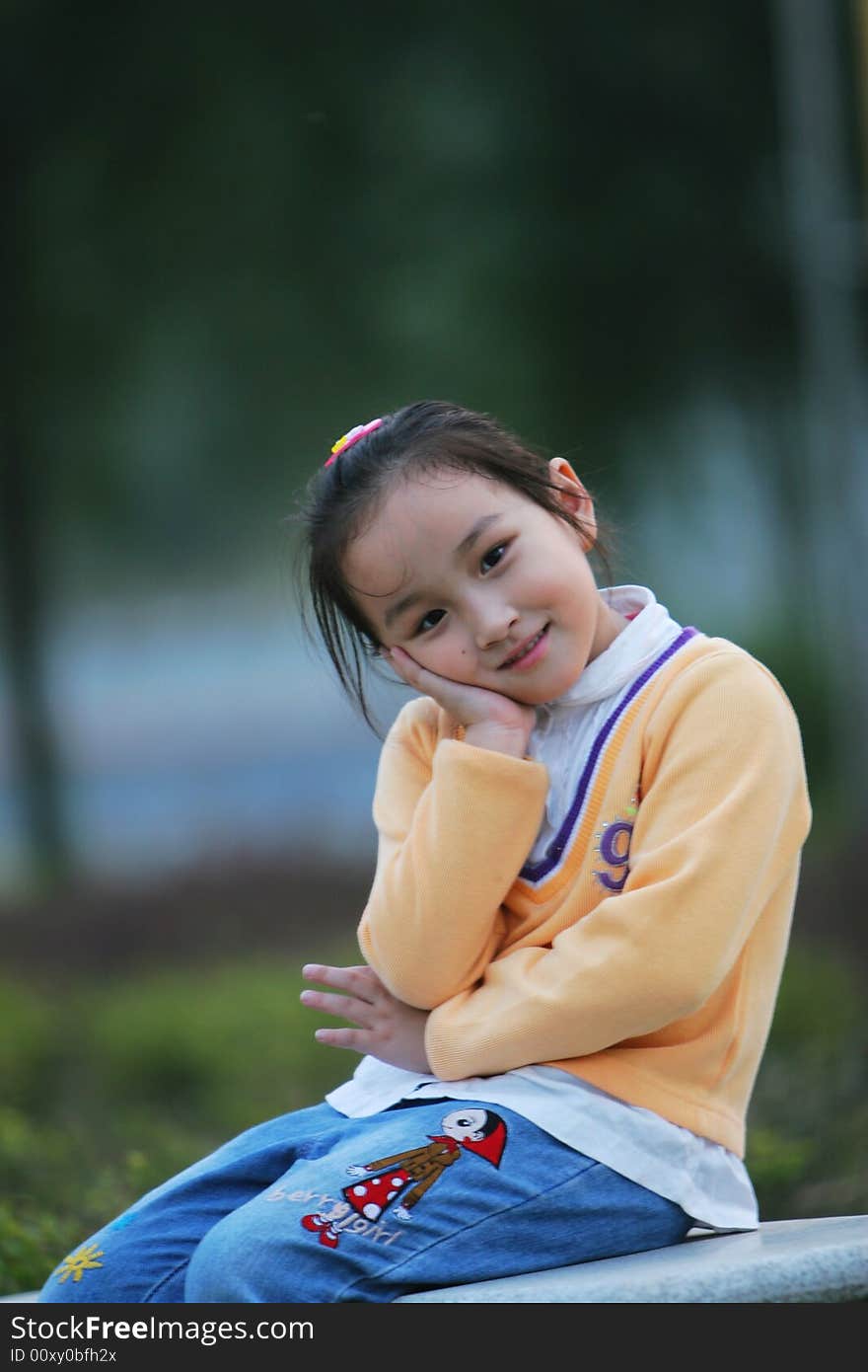 The cute girl in a park. The cute girl in a park.