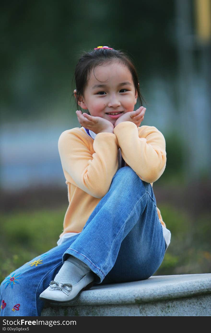 The cute girl in a park. The cute girl in a park.