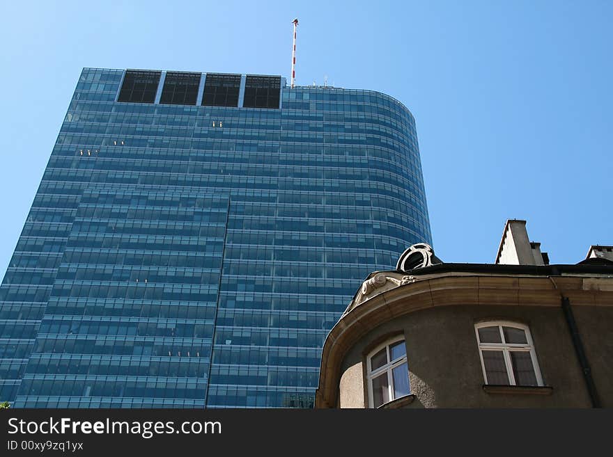 Office building and old house in Warsaw. Office building and old house in Warsaw