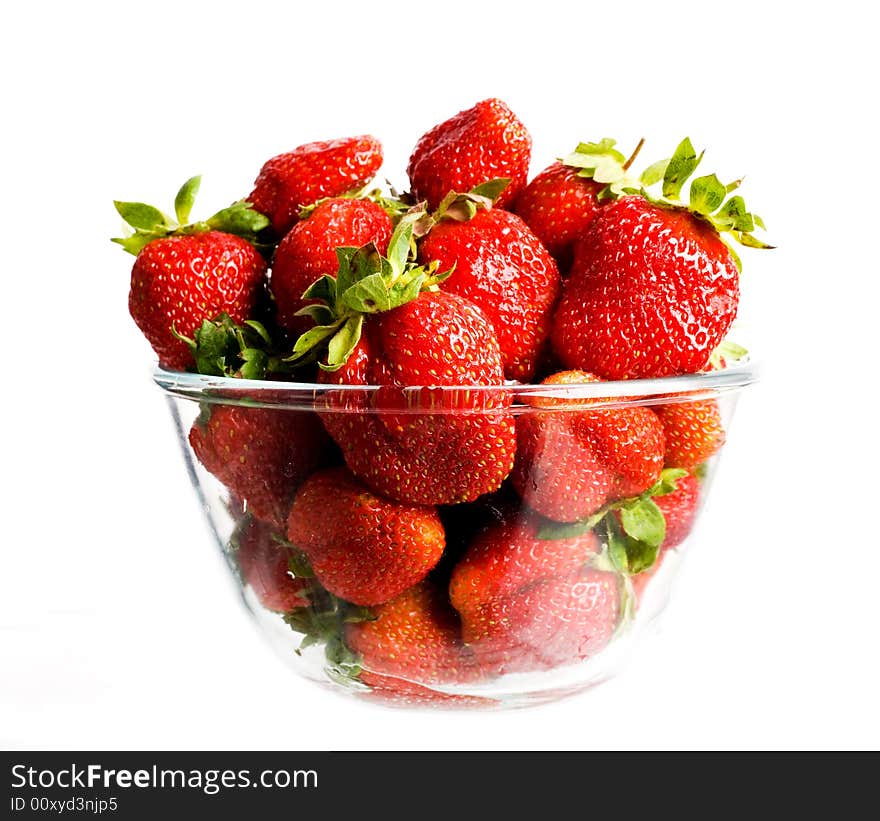 An image of big red strawberries in glass. An image of big red strawberries in glass