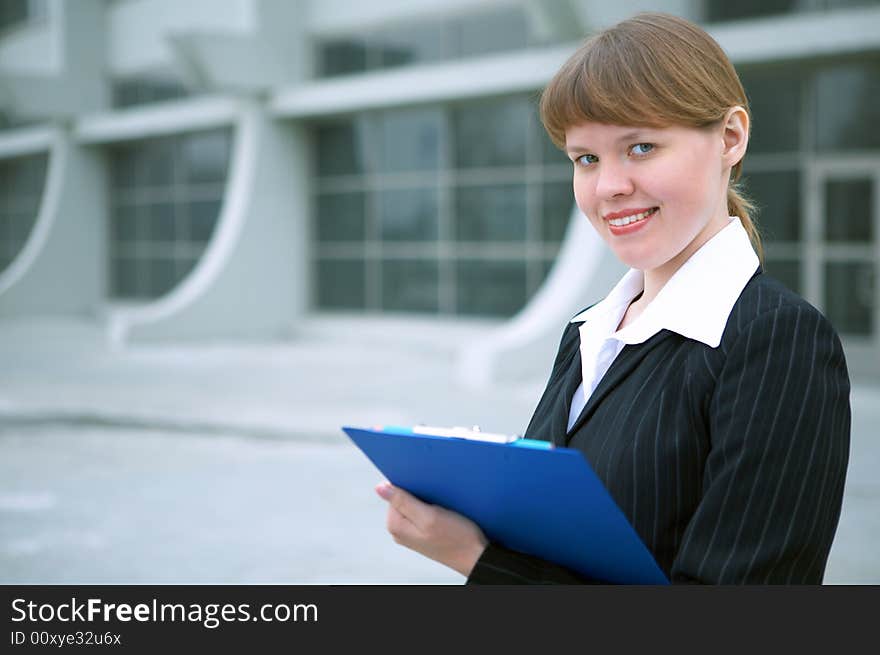 Business woman over modern building