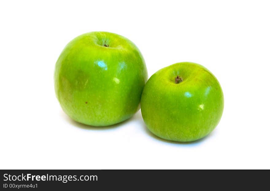 Two green apples on white background (isolated)