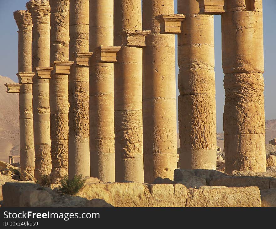 Ancient ruins in Palmyra in desert, Syria. Ancient ruins in Palmyra in desert, Syria