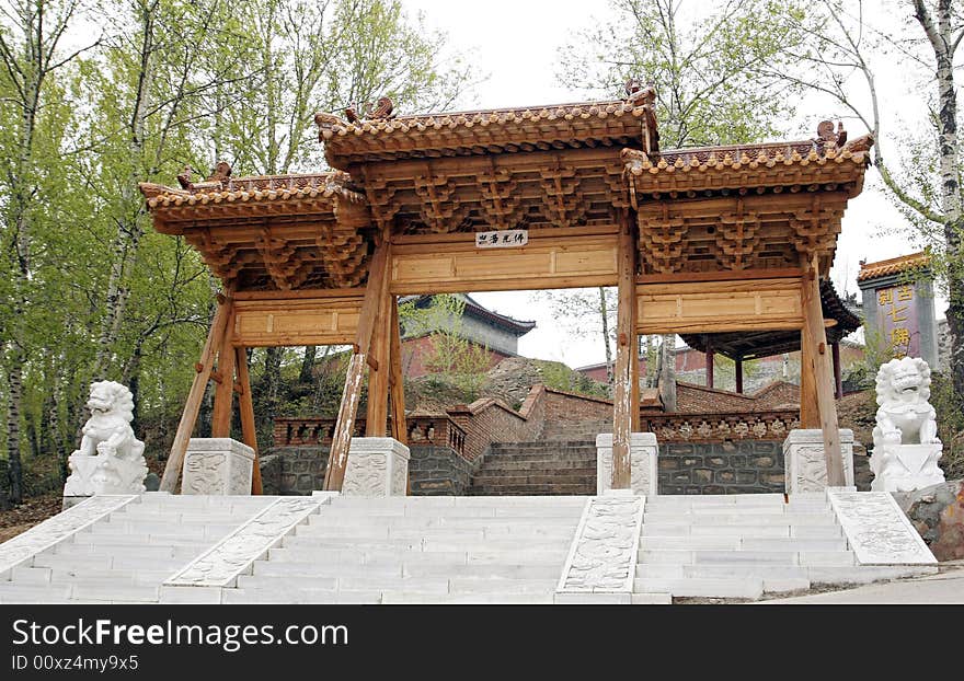 Temple gate while repairing.
Chinese on the temple gate is Buddha's glory.

Chinese characters are seven temple(Buddhist)s on the stone tablet on the right. Temple gate while repairing.
Chinese on the temple gate is Buddha's glory.

Chinese characters are seven temple(Buddhist)s on the stone tablet on the right.