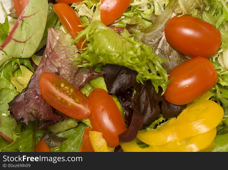 Spring mix with tomato and bell pepper. Spring mix with tomato and bell pepper