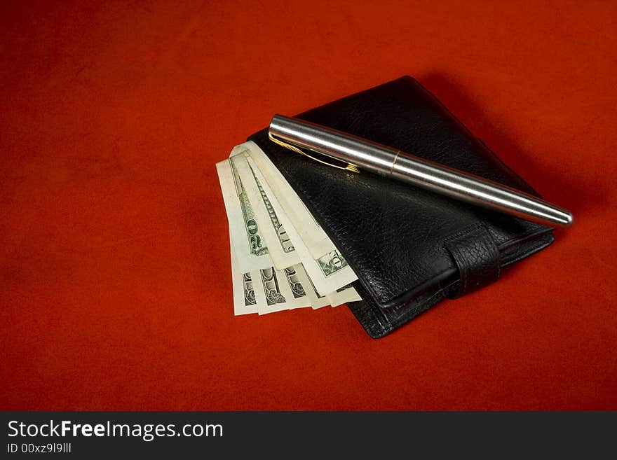 Wallet and pen