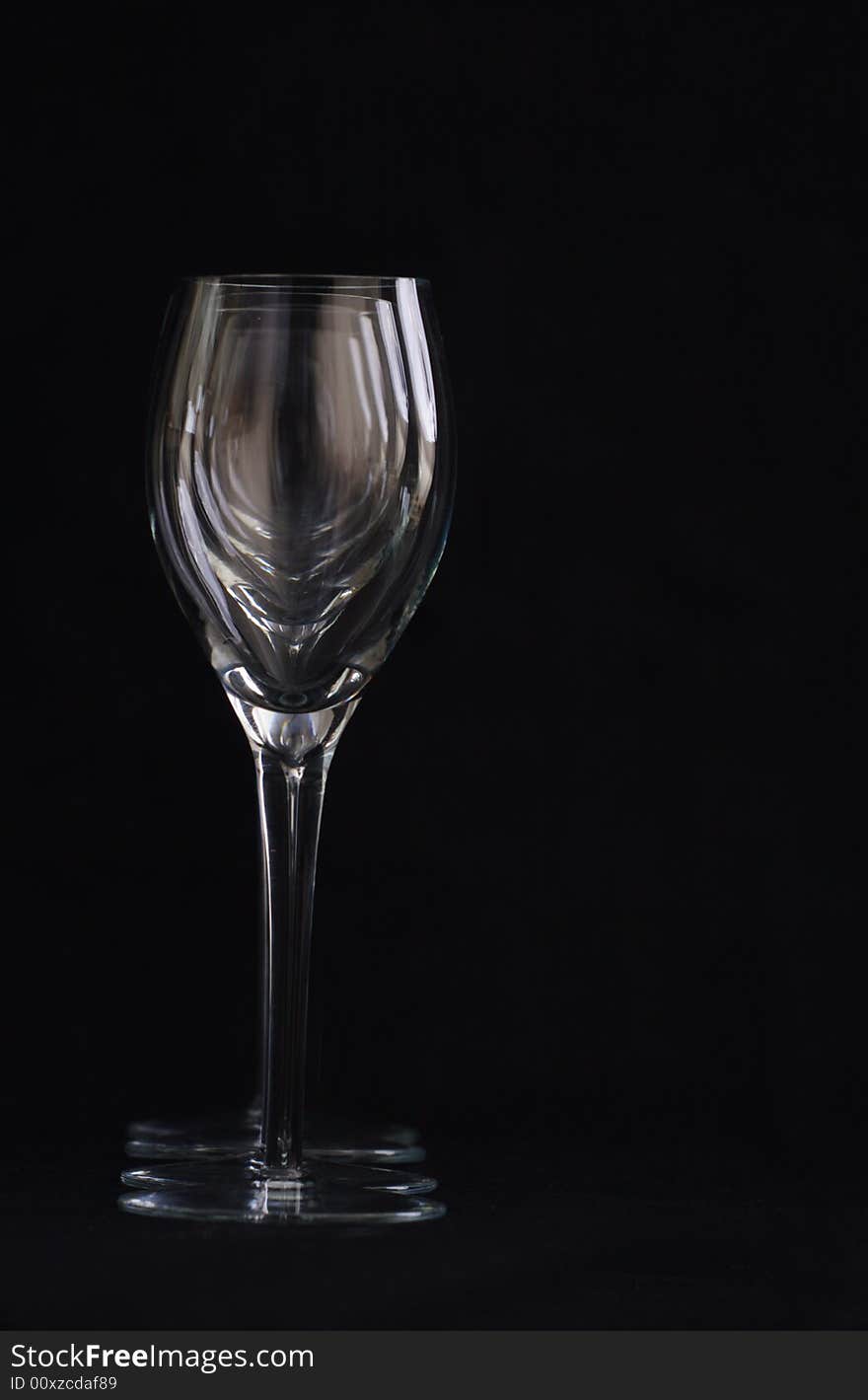 Wine glasses on black background. Wine glasses on black background