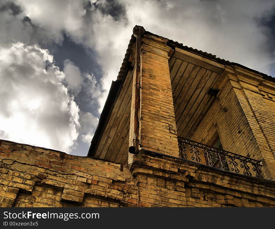 Attic of the old bulding background the sky. Attic of the old bulding background the sky