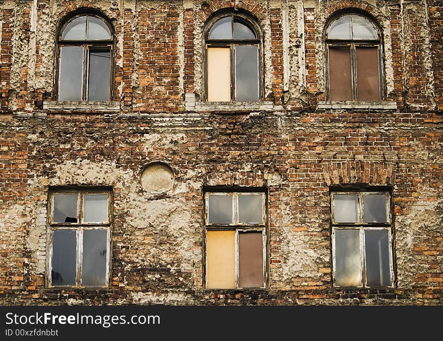 Six windows in an old red brick brown stone building before demolition endings and beginnings. Six windows in an old red brick brown stone building before demolition endings and beginnings