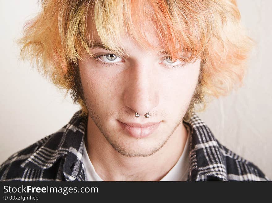 Close-Up of a Punk Boy with Brightly Colored Hair