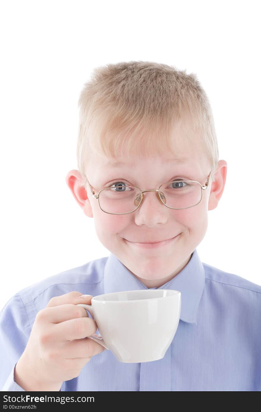 Boy enjoying a nice warm cup of coffee. Isolated on white background