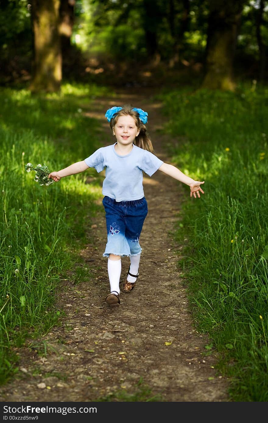 Girl running in park