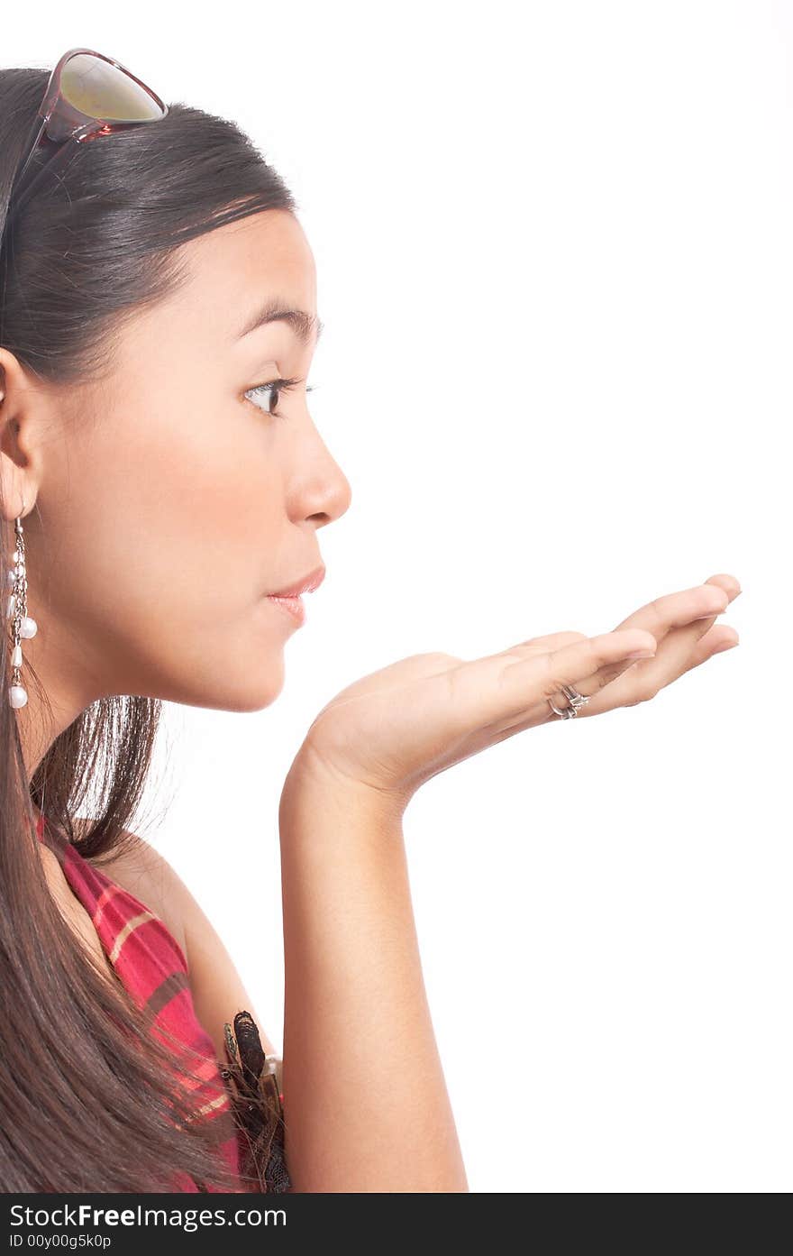 Young lady blowing kisses to her valentine